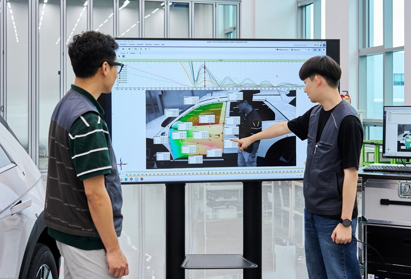 Engineers review dynamic motion validation results